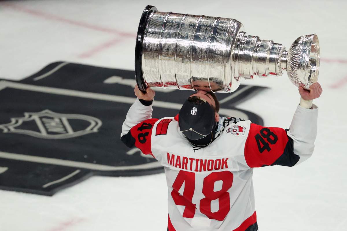 Jordan Martinook, #48 of the Carolina Hurricanes, kisses the Stanley Cup Trophy after winning in Game 6 of the 2026 Stanley Cup Final against the Vegas Golden Knights on June 14, 2026.