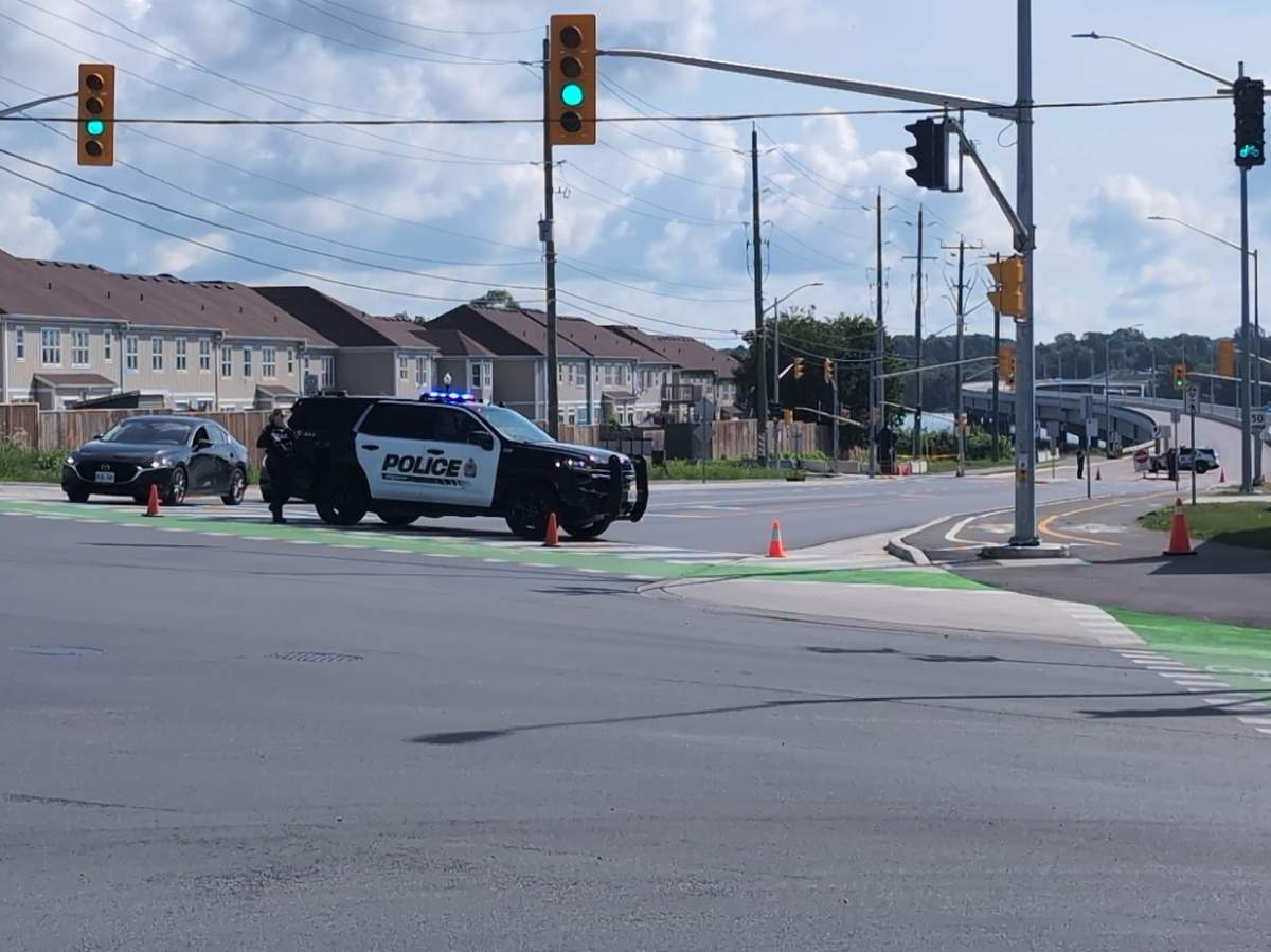 Kingston police are pictured at the scene at Wabaan Crossing after a police shooting.