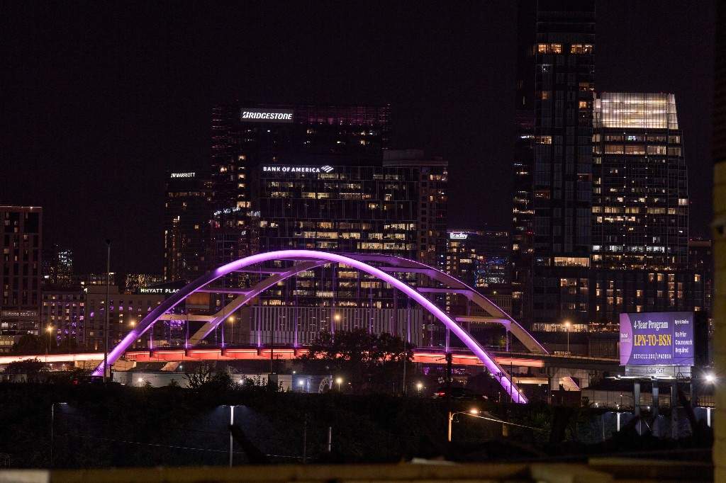 The Korean War Veterans Bridge is lit in pink lights to honor Dolly Parton, Tuesday, Aug. 25, 2026, in Nashville, Tenn.