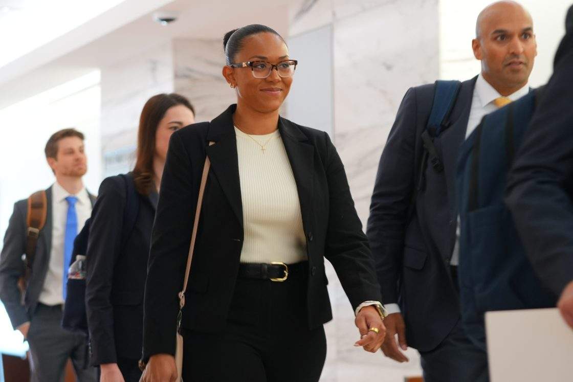 McKenna West, left, arrives with her legal team for a court hearing in Dallas, Tuesday, Aug. 25, 2026.