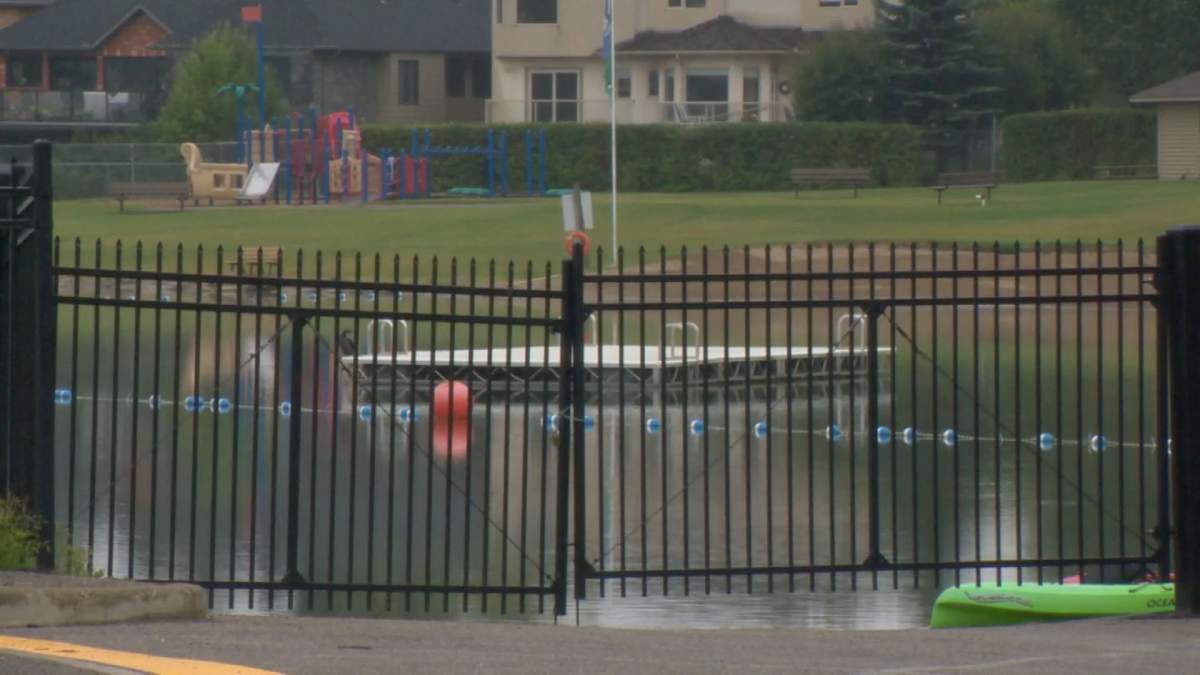 Sundance Lake in Calgary's southeast is shown on Aug. 14, 2026. Alberta Health Services has issued an advisory for residents and visitors to watch for blue-green algae.