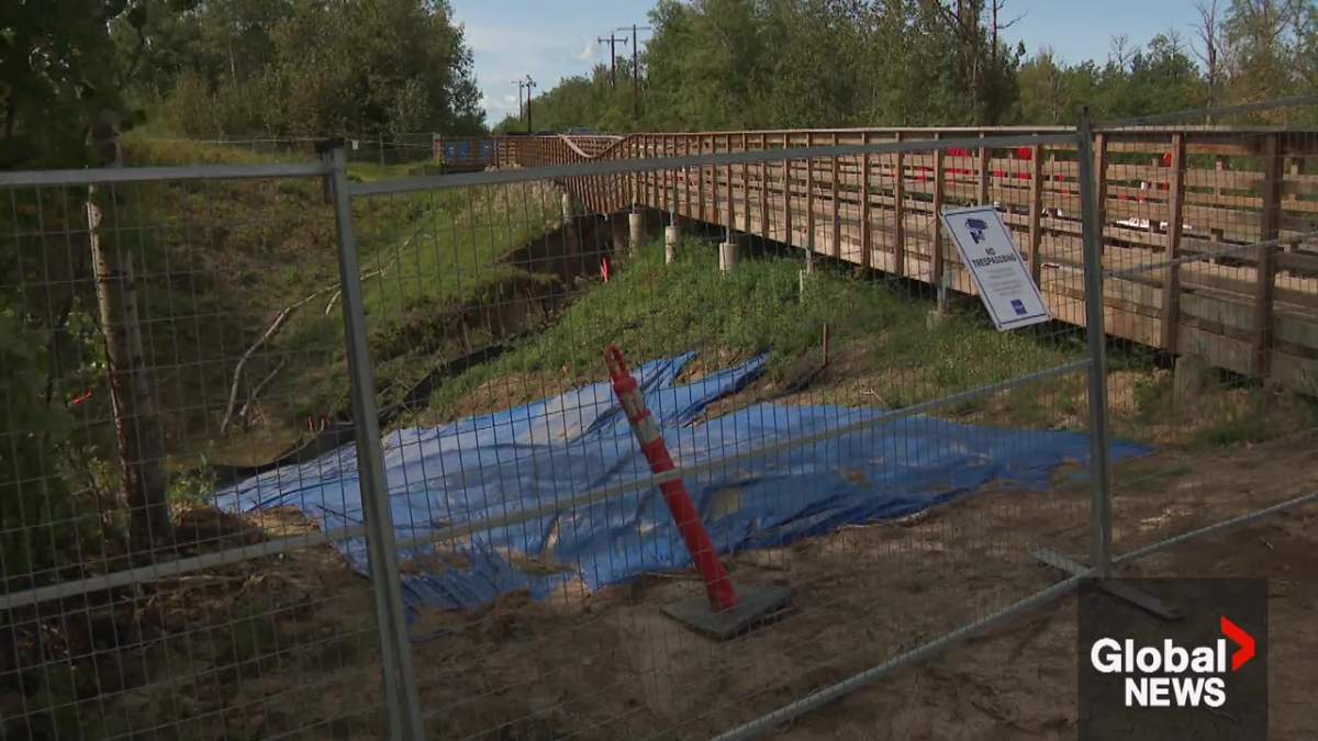 Heavy rainfall in July 2026 caused Horseshoe Creek to overflow in northwest Edmonton, leading to a stretch of 137 Avenue being washed away.