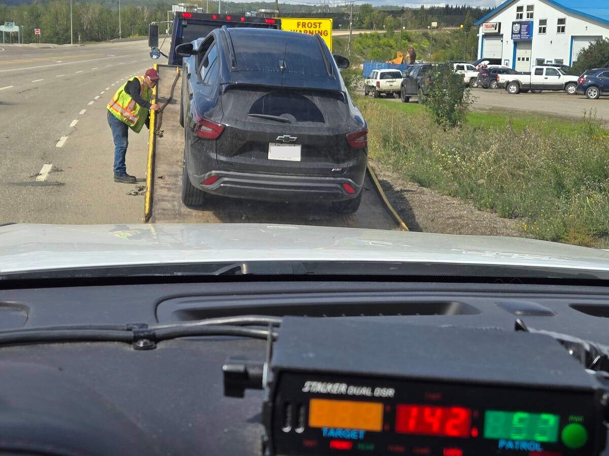 The Alberta driver's car was towed and impounded for seven days.