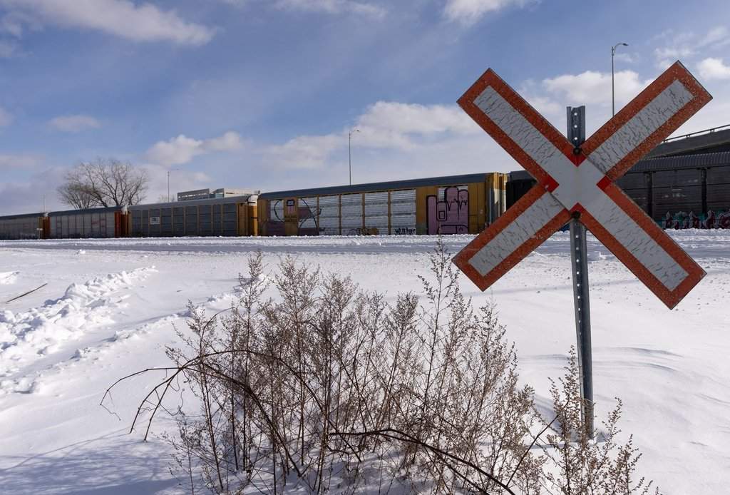A train is seen on the tracks in Dorval, Que., on Tuesday, Feb. 18, 2025.