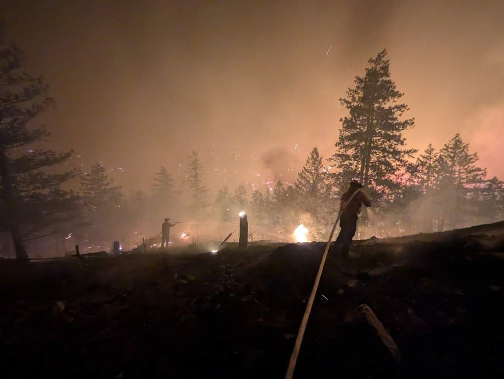 Fire crews fight the Bald Range wildfire west of Summerland, B.C., in this Friday, Aug. 7, 2026, handout photo. THE CANADIAN PRESS/Handout — B.C. Wildfire Service.