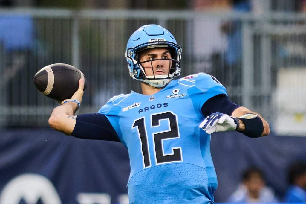 Toronto Argonauts quarterback Chad Kelly (12) passes during first half CFL football action against the Calgary Stampeders in Toronto, on Thursday, Aug. 6, 2026. THE CANADIAN PRESS/Sammy Kogan.