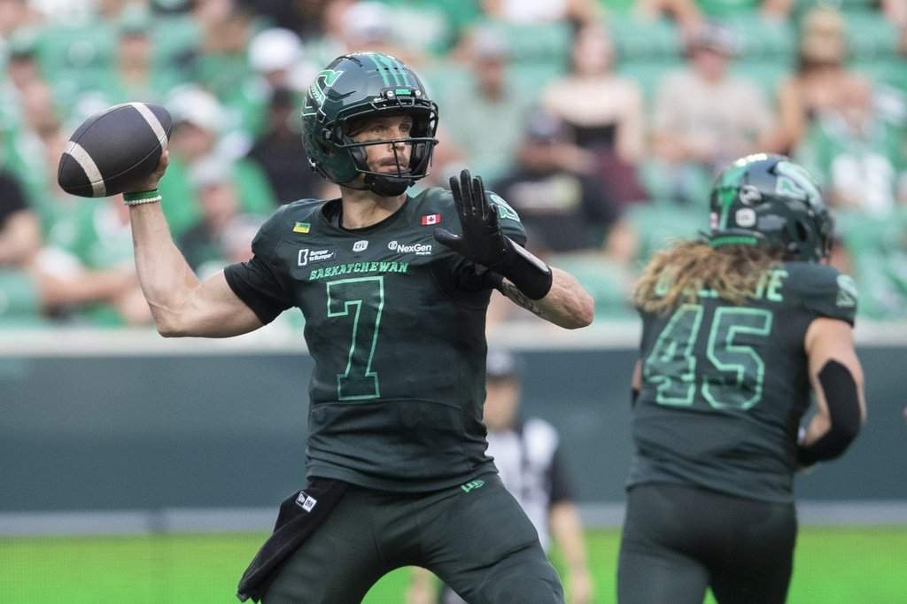 Saskatchewan Roughriders quarterback Trevor Harris (7) looks to make a pass during first half CFL football action against the Edmonton Elks in Regina on Thursday, July 23, 2026. THE CANADIAN PRESS/Kayle Neis.