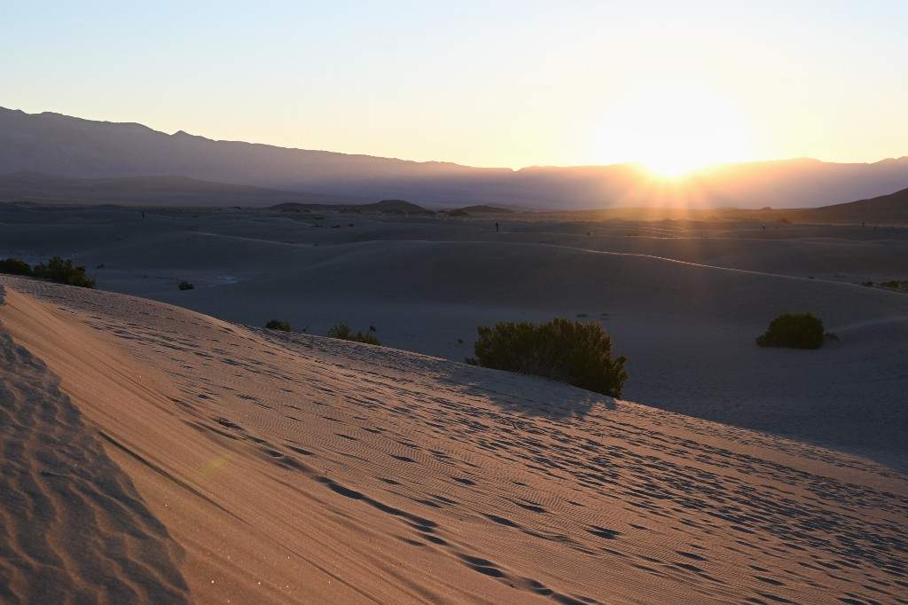 The sun rises over the Mesquite Flat Sand Dunes, Saturday, March 7, 2026, in Death Valley National Park, Calif.