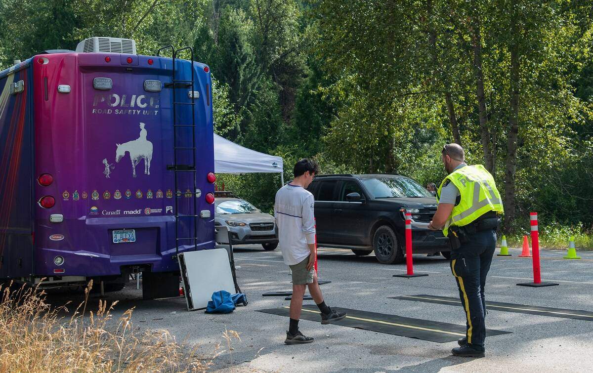 B.C. Highway Patrol officers conducting a roadside check near Salmo B.C.