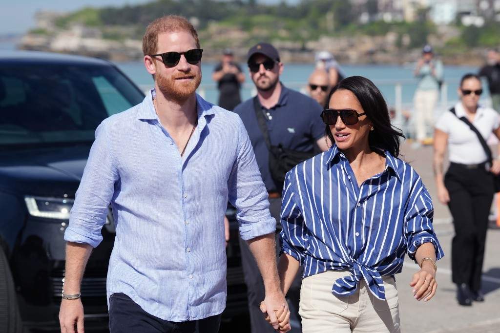 Prince Harry, and Meghan, the Duke and Duchess of Sussex, arrive for an event, during a visit to Bondi Beach, Australia, April 17, 2026.