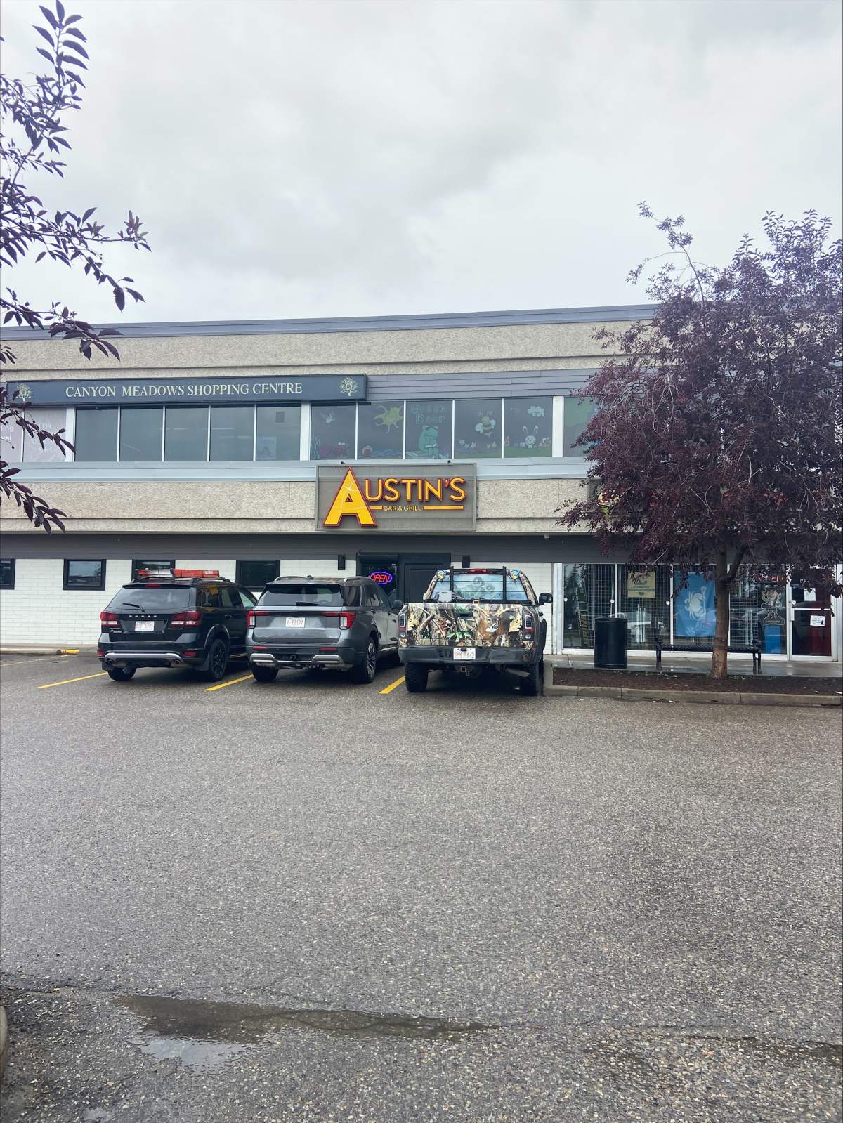 Austin's Bar and Grill in the Canyon Meadows Shopping Centre is shown on Aug. 12, 2026.