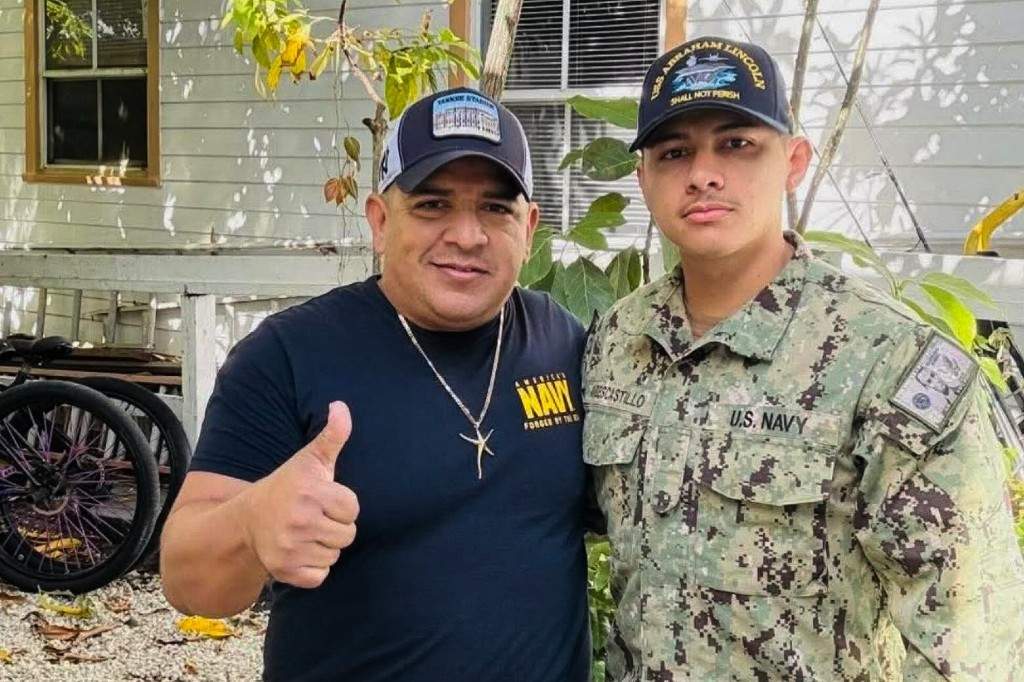 In this photo courtesy of Katherine Delgado shows her step-father Luis Manuel Aviles, left, and her brother Joshua Aviles stand outside their home in Oct. 2025.