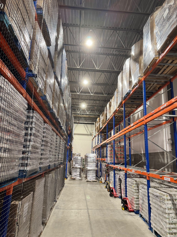 The Food Banks Alberta warehouse stocked with pallets of food in early August.