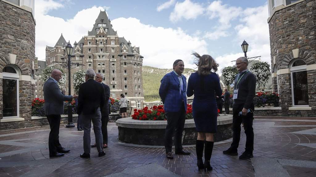 Attendees enjoy an outdoor break at the Global Business Forum in Banff, Alta., Thursday, Sept. 24, 2020. 