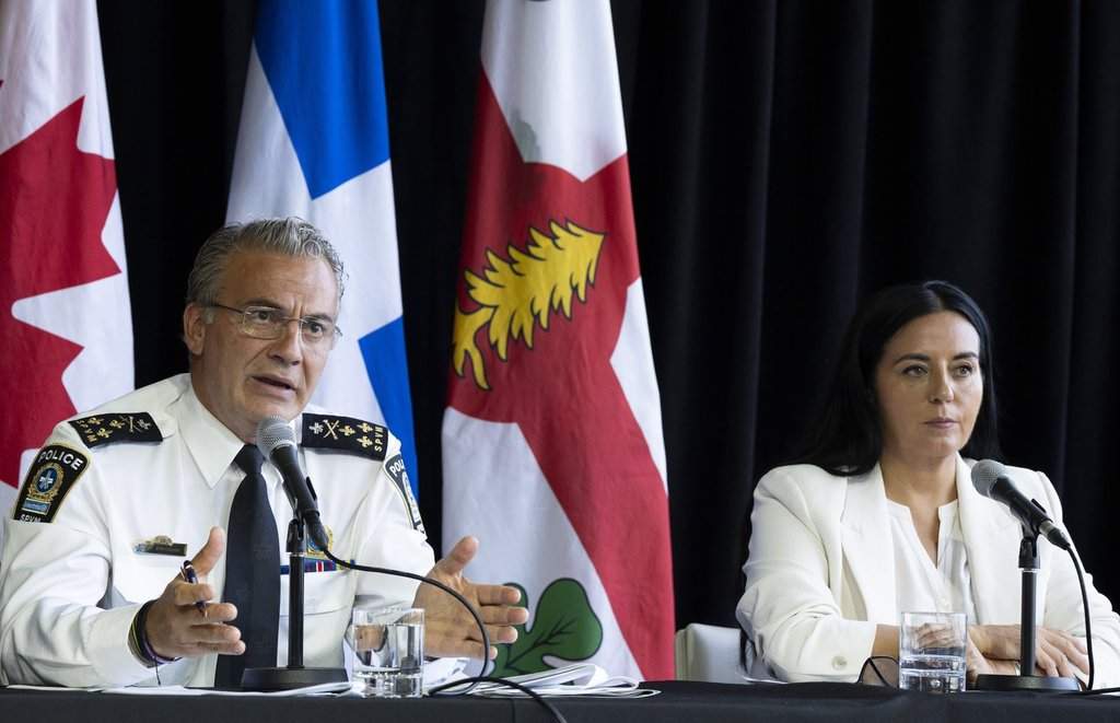 Montreal police chief Fady Dagher and Montreal Mayor Soraya Martinez Ferrada announce that the police will be equipped with body cameras during a press conference in Montreal on Friday, Aug. 21, 2026.