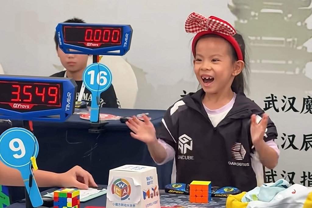 In this photo taken from video and released by YouTube@cuberootme, 6-year-old Lian Yunzhi reacts after solving a Rubik's cube at a World Cube Association-certified competition in the central Chinese city of Wuhan in central China's Hubei province on Sept. 13, 2026.