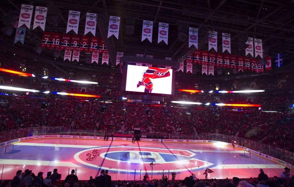 The Montreal Canadiens logo is projected onto the ice at the Bell Centre in Montreal on Tuesday, October 10, 2017. THE CANADIAN PRESS/Graham Hughes.