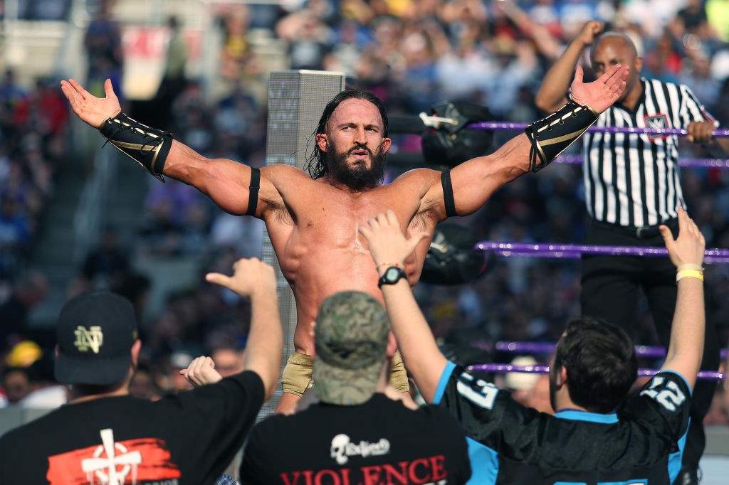 Adrian Neville, also known as Benjamin Satterley, celebrates with fans during WrestleMania 33 on Sunday, April 2, 2017 at Camping World Stadium in Orlando, Fla.