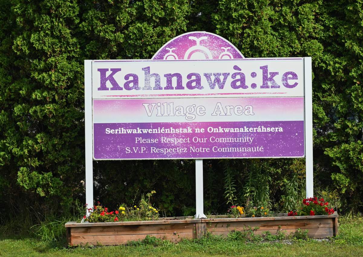 A sign for the territory of Kahnawake is shown in Kahnawake, Que., on Thursday, Sept. 3, 2026. 
