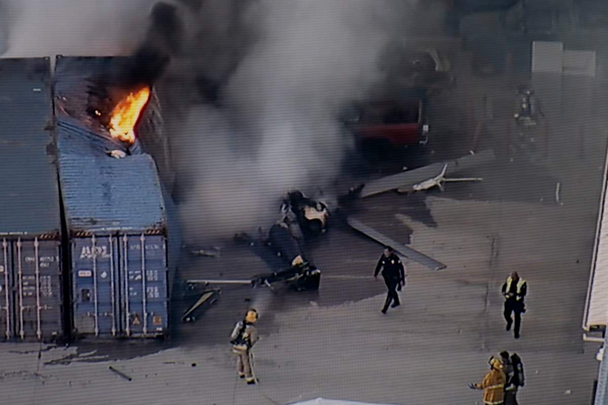 In this still image provided by KABC-TV shows first responders work the scene after a helicopter crashed near a bus crash in Chatsworth, a neighborhood in Los Angeles, Tuesday, Sept. 15, 2026. 