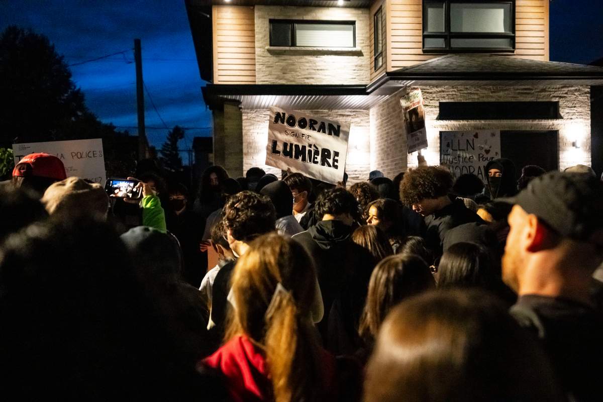 Family, friends and supporters of 15 year-old Nooran Rezayi, who was killed last year by police, gather at a vigil held in his honour, in Longueuil, Que., on Monday, Sept. 21, 2026.