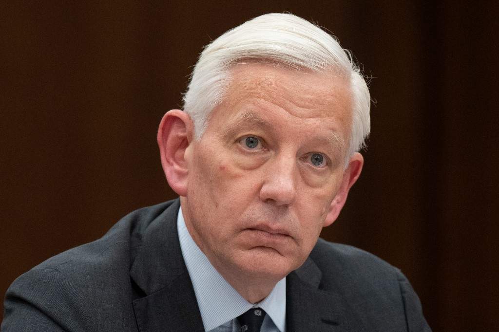 Dominic Barton waits to appear as a witness at the Standing Committee on Government Operations and Estimates, Wednesday, February 1, 2023 in Ottawa.
