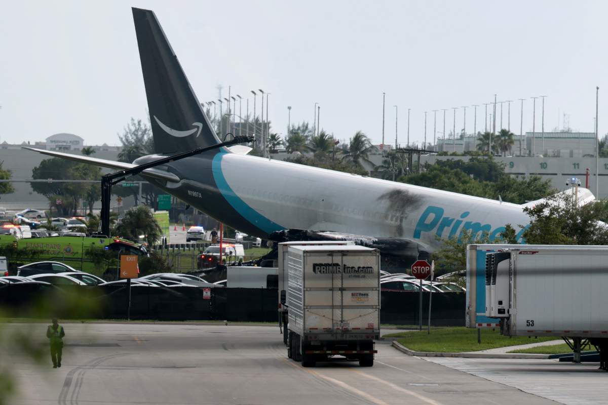 MIAMI, FLORIDA - SEPTEMBER 06: An Amazon cargo plane is seen after it crashed at Miami International Airport on September 06, 2026 in Miami, Florida. In a statement, the Federal Aviation Administration said Prime Air Flight 7598 overran the runway while landing around 2 p.m. after departing from Luis Muñoz Marín International Airport in San Juan, Puerto Rico, earlier today.