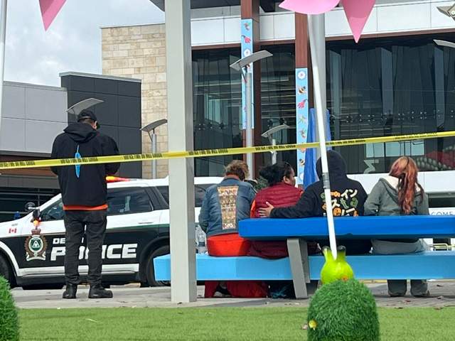 Police tape and emergency services on the scene at Tsawwassen Mills Mall in Delta on Wednesday morning.