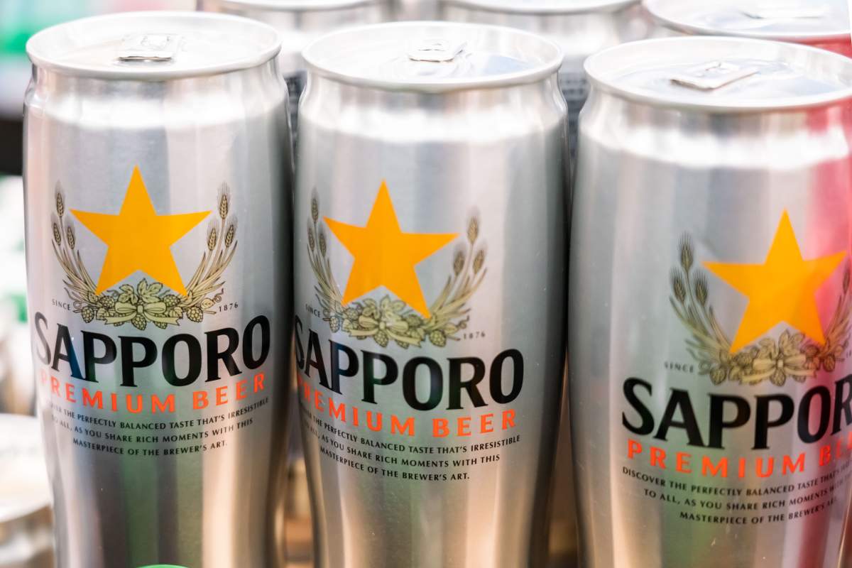 File: Cans of Sapporo Beer seen in a supermarket.