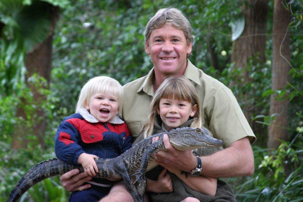 FILE: Robert, Steve and Bindi Irwin pose with 3yr old alligator Russ at Australia Zoo on June 25, 2005 on the Sunshine Coast in Australia. 