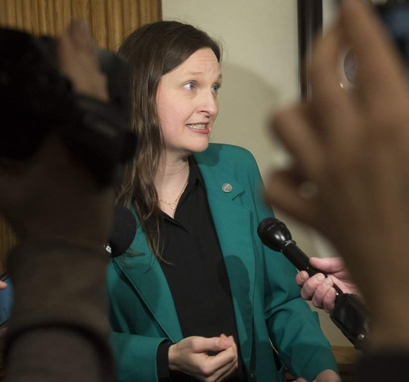 Green Party legislator Megan Mitton listens to the budget delivered by New Brunswick Finance Minister René Legacy in the legislature in Fredericton, New Brunswick, on Tuesday March 17, 2026.  THE CANADIAN PRESS/Stephen MacGillivray.