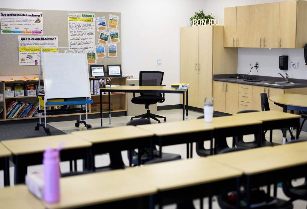A teacher's desk in a classroom is seen at Wazoson Public School of the Ottawa-Carleton District School Board (OCDSB) in Ottawa, on Friday, Dec. 5, 2025. 