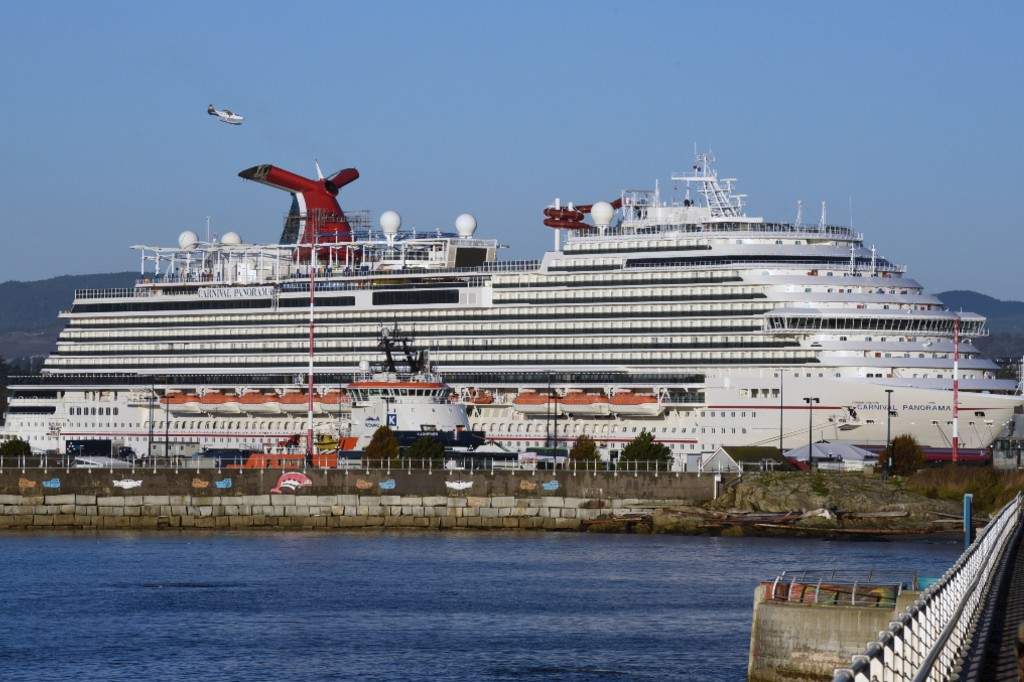A Harbour Air float plane is pictured above the funnel on the cruise ship Carnival Panorama docked at Ogden Point in Victoria, British Columbia on November 23, 2023.