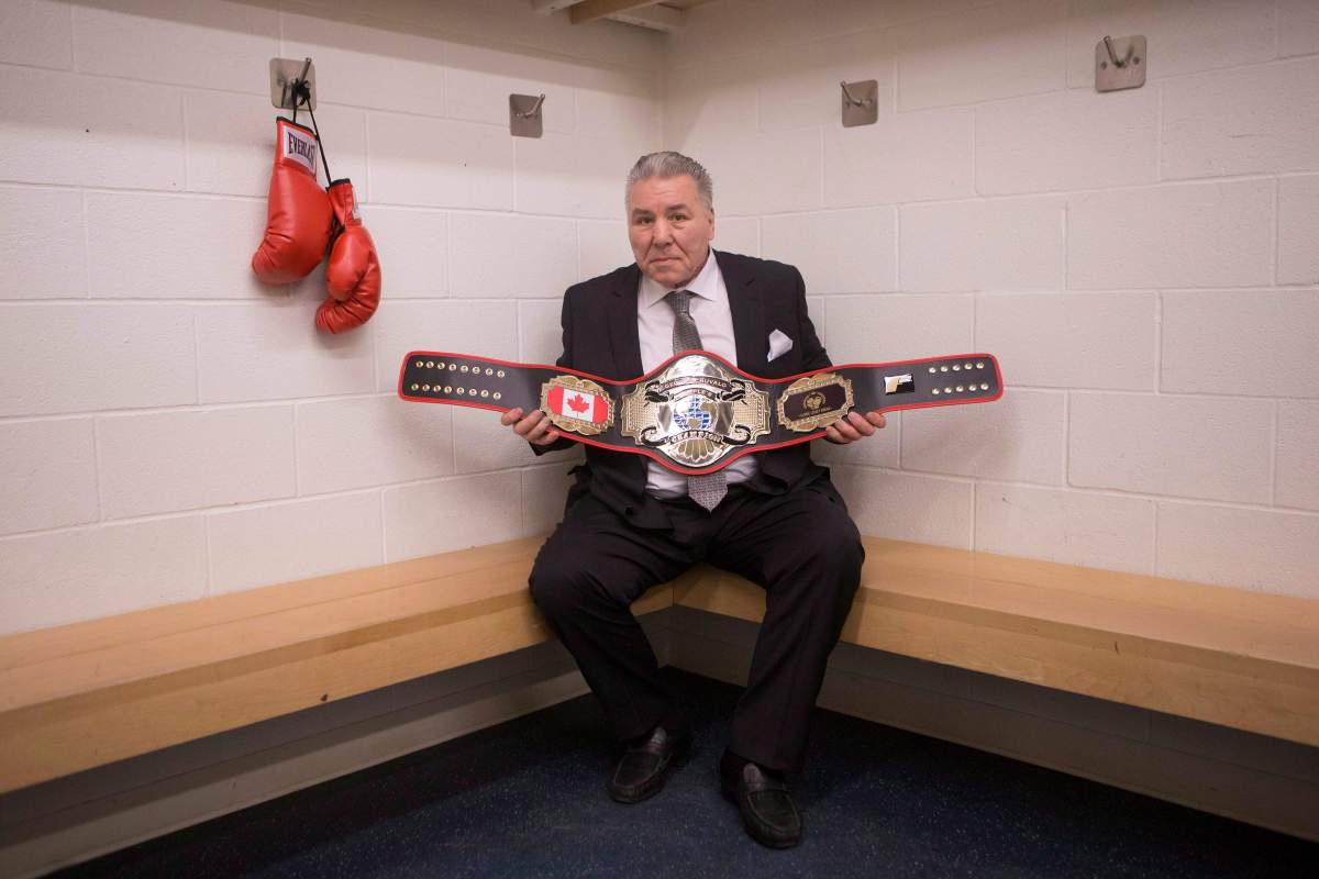 Former Boxer George Chuvalo sits with a honoury ‘People’s Champion’ belt presented to him at Toronto’s Mattamy Centre, formerly known as Maple Leaf Gardens, on Tuesday, March 29, 2016. Chuvalo’s epic 15-round bout at Maple Leaf Gardens against Muhammad Ali on March 29, 1966 transformed the lightly regarded Toronto fighter into a symbol of courage and determination. THE CANADIAN PRESS/Chris Young
