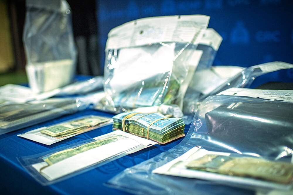Cash seized in Quebec in an RCMP investigation into cocaine trafficking is shown.