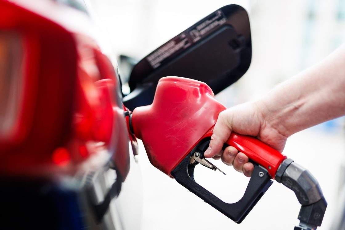 FILE - A person pumps gas at a gas station in Toronto, on Wednesday, Sept. 2, 2026. 