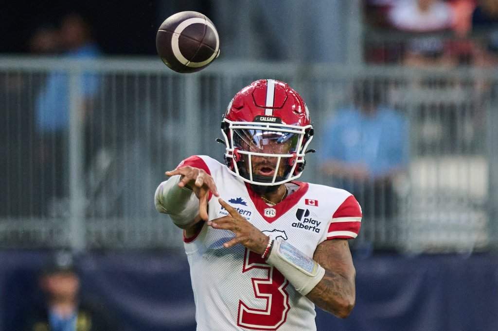Calgary Stampeders quarterback Vernon Adams Jr. (3) passes during first half CFL football action against the Toronto Argonauts in Toronto, on Thursday, Aug. 6, 2026. THE CANADIAN PRESS/Sammy Kogan.
