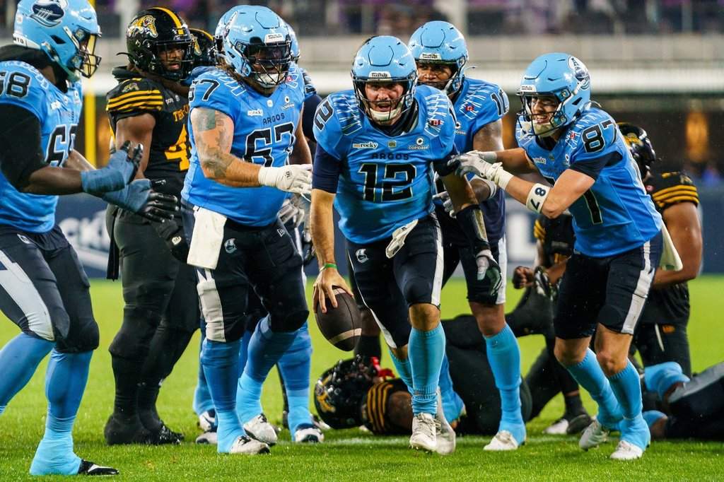 Toronto Argonauts quarterback Chad Kelly (12) celebrates after scoring a touchdown against the Hamilton Tiger-Cats during second half CFL action in Toronto, on Saturday, Aug. 22, 2026. THE CANADIAN PRESS/Keito Newman.