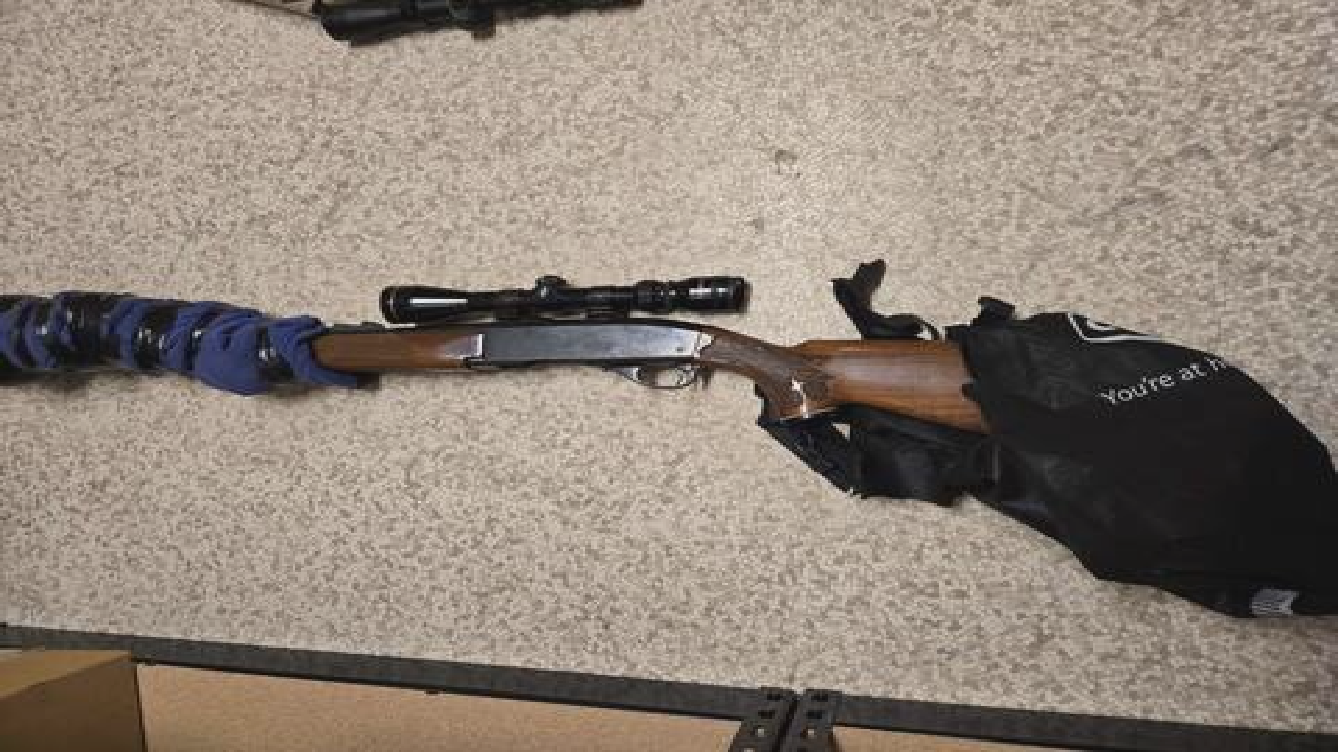 A high-powered rifle was seized by RCMP in Manitoba after they say a suspect used it to assault a woman in her home. 