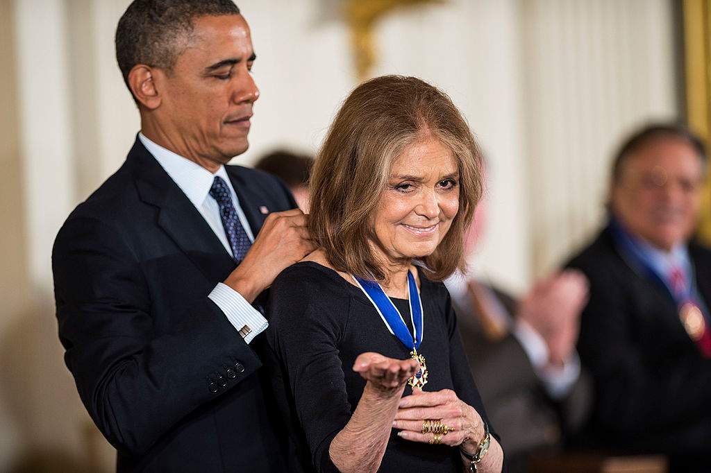 Gloria Steinem (R) receives the 2013 Presidential Medal of Freedom from President Barack Obama at the White House on November 20, 2013 in Washington, DC.