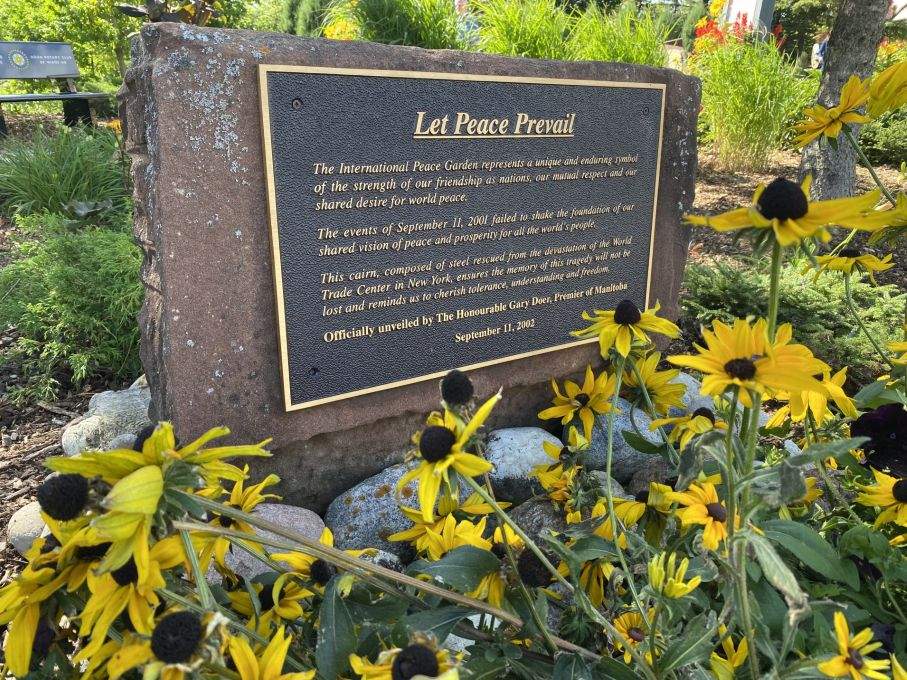 Hundreds gathered at the International Peace Garden Friday to remember the 9/11 terrorist attacks.