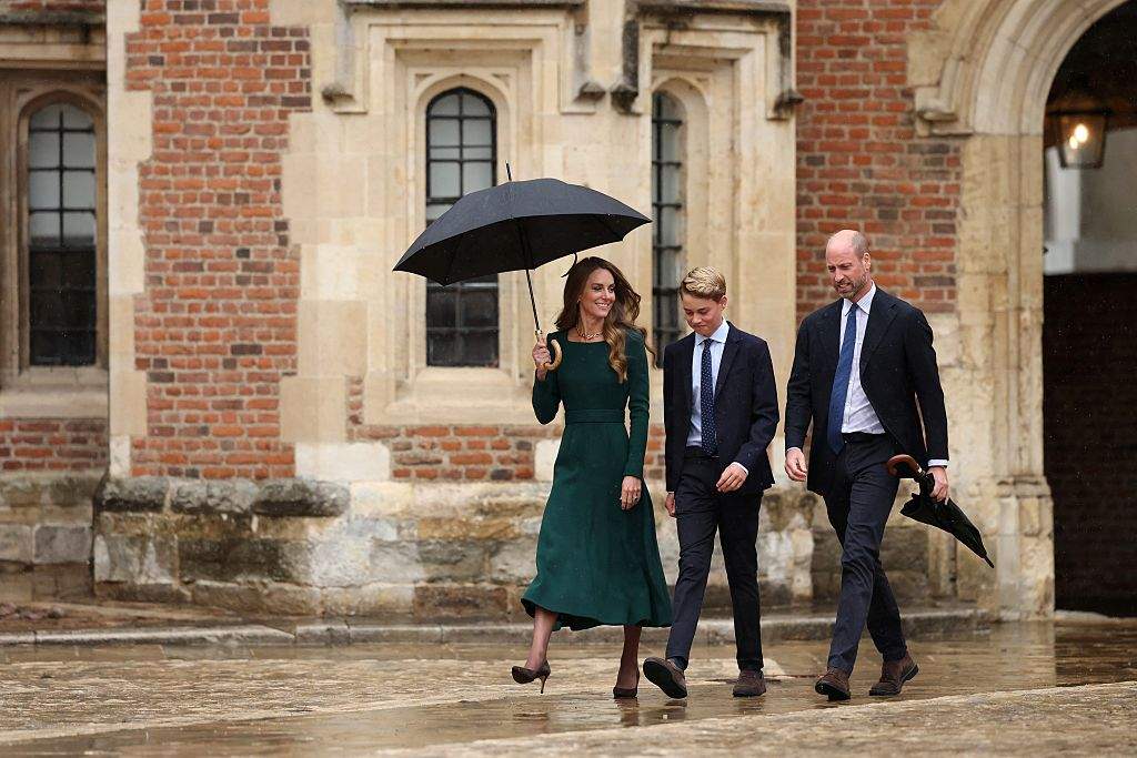 Britain's Catherine, Princess of Wales (L) and Britain's Prince William, Prince of Wales (R) walk with their 13-year-old son, Britain's Prince George of Wales (C), as he arrives for his first day at Eton College, in Eton, west of London, on September 8, 2026. 