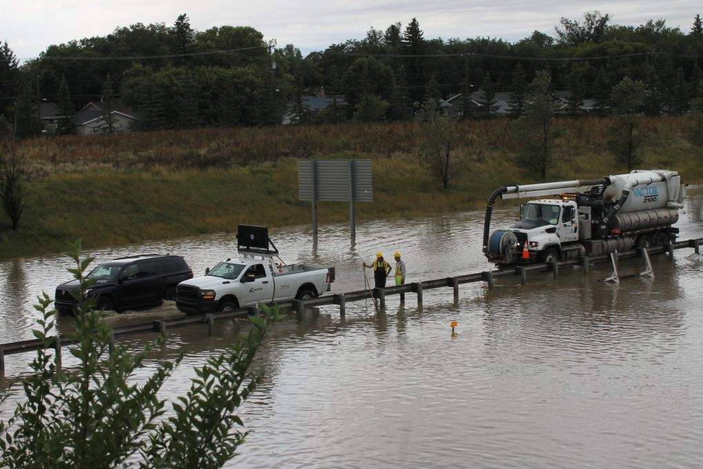 A sinkhole deteriorated further, and parts of Regina flooded, after the city saw more than 100 mm of rain on Sunday and Monday.