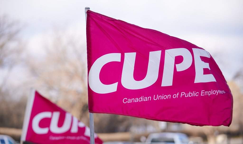 A Canadian Union of Public Employees (CUPE) flag during an education support workers rally outside of the Saskatchewan Legislative Building in Regina, Tuesday, Nov. 25, 2025. THE CANADIAN PRESS/Heywood Yu.