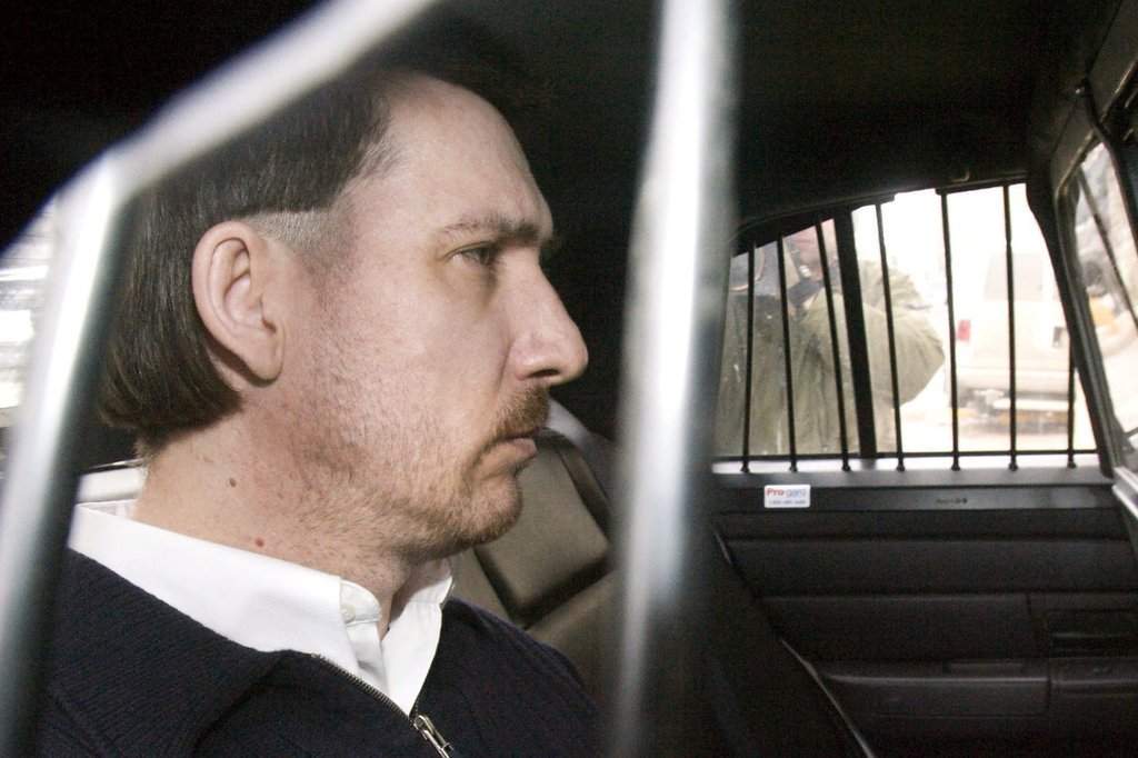 Convicted murderer Curtis Dagenais is escorted from court following sentencing in his murder trial Friday, March 13, 2009 in Saskatoon, Sask. THE CANADIAN PRESS/Geoff Howe.