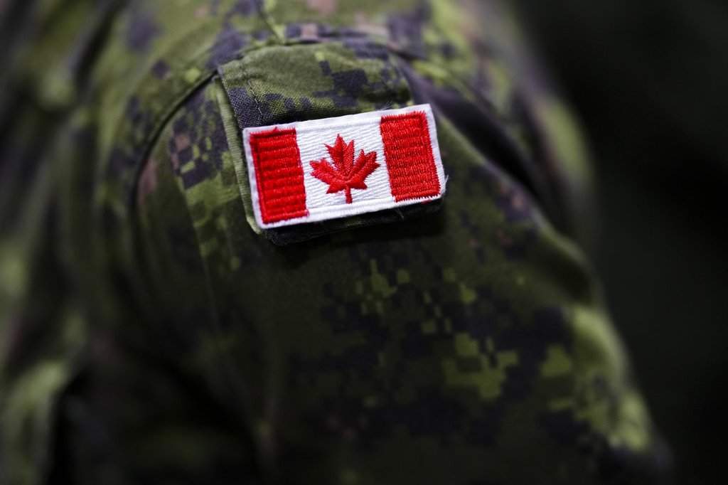A Canadian soldier takes part in an announcement regarding the arrival of new ambulance variants to the armoured combat support vehicle fleet at Garrison Petawawa in Petawawa, Ont., on Thursday, Oct. 19, 2023. THE CANADIAN PRESS/Sean Kilpatrick.