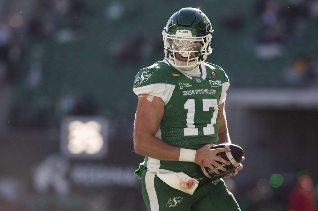 Saskatchewan Roughriders quarterback Tommy Stevens (17) scores a touchdown against the Edmonton Elks during first half CFL football action in Regina on Saturday, Oct. 24, 2026. THE CANADIAN PRESS/Kayle Neis.