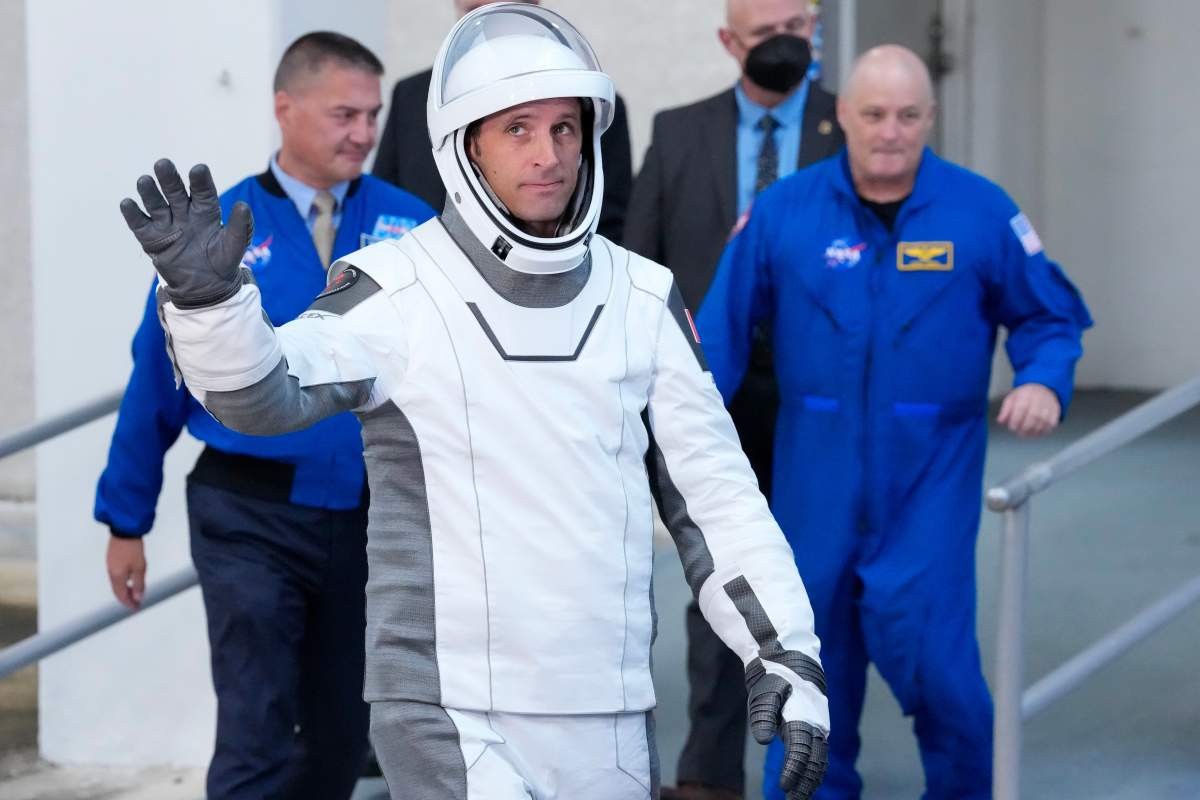 Astronaut Joshua Kutryk, of Canada, waves as he leaves the Operations and Checkout Building at the Kennedy Space Center in Cape Canaveral, Fla., Thursday, Oct. 1, 2026.