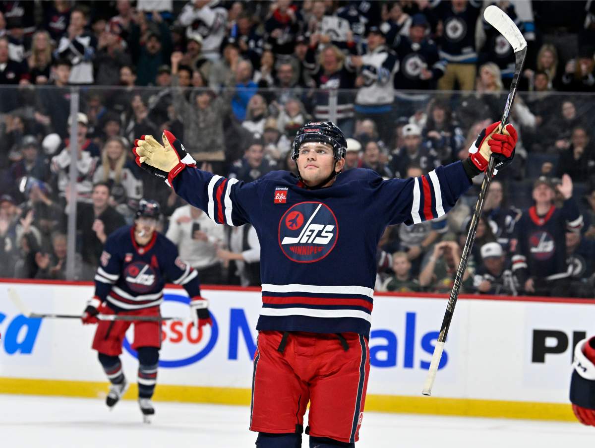 Winnipeg Jets' Cole Perfetti (91) celebrates his goal against the Minnesota Wild during second period NHL hockey action in Winnipeg on Tuesday, Oct. 13, 2026. THE CANADIAN PRESS/Fred Greenslade.