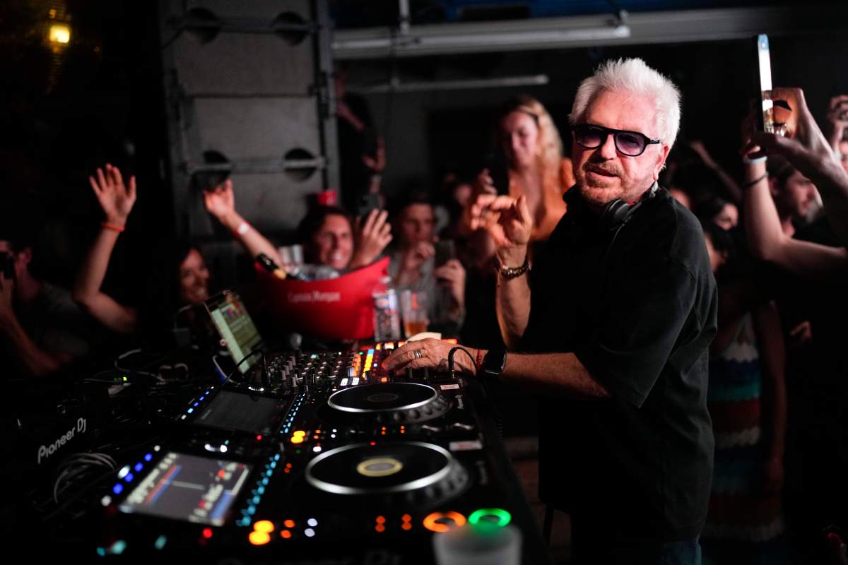 French musician Marc Cerrone performs during the DiscOlympics at Wanderlust night club at the 2024 Summer Olympics, Monday, July 29, 2024, in Paris, France. (AP Photo/Natacha Pisarenko).